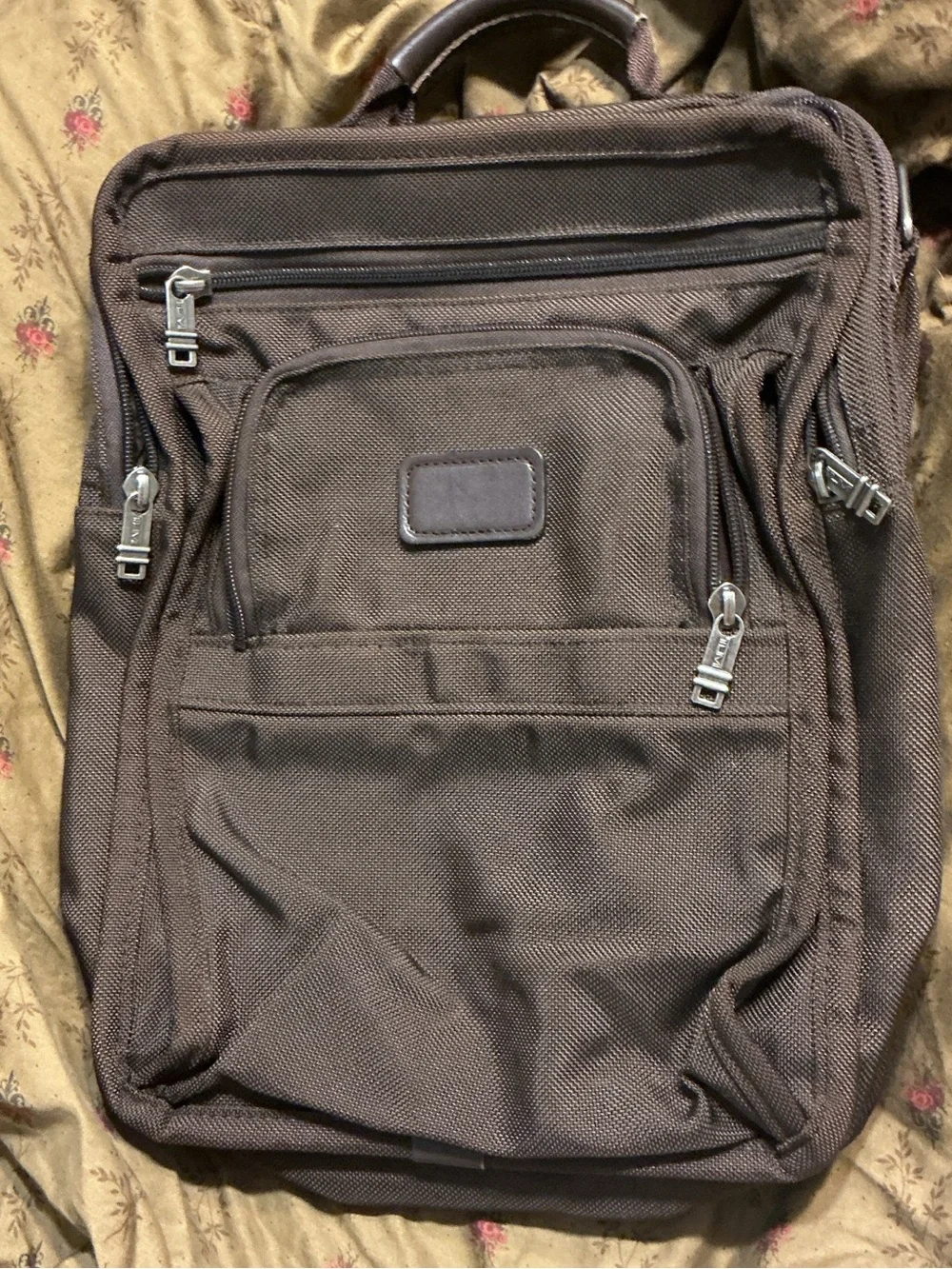Tumi Brown Men's Backpack with Silver Hardware